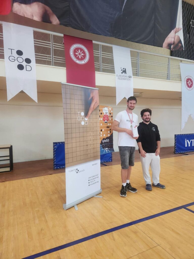 The runner-up receiving his prize