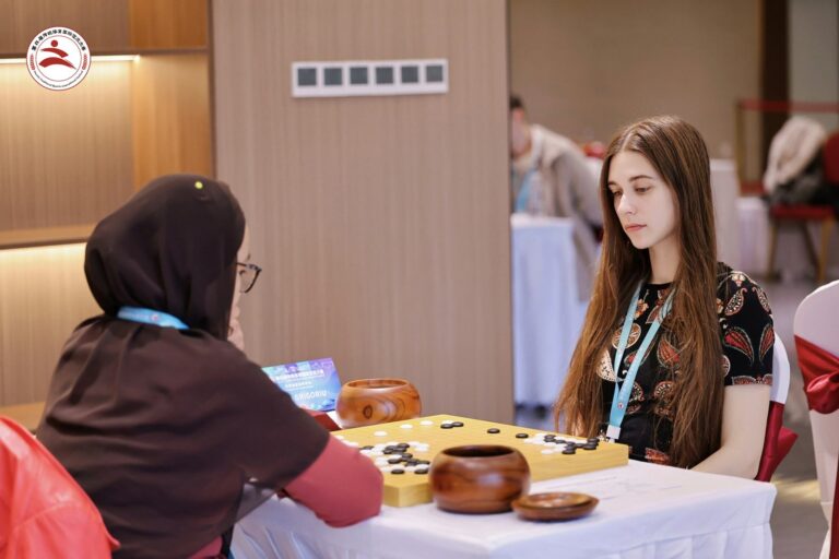 Round 1: Mirta Grigoriu (Croatia), right, against Maira Altynbassova (Kazakhstan)